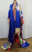 A 20th c. Japanese kimono, printed silk, dark blue ground with gold, red and purple chrysanthemum