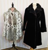 1980's faux-fur coat, shaggy, printed in blacks and greys, a black faux-fur coat labelled Leslie