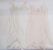 A quantity of nylon and polyester vintage nightgowns to include blue negligee dressing gown, lace