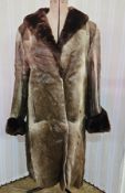 Vintage goatskin coat with faux-fur cuffs and collar, satin lining, pockets