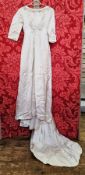 1960's/70's wedding dress labelled Fenwicks Salon, ivory satin with applique detail to the bodice,