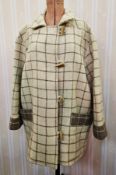 Boiled wool three-quarter length cream and grey broad check coat with horn and loop button