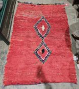 Modern red ground rug with two stepped lozenge medallions, on red field, 186cm x 122cm