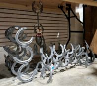 Two pyramid three-bottle wine stands, a magazine stand, two tower three-bottle wine stands and small