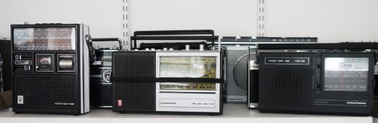 11 vintage transistor radios including Grundig models; Top Boy 500, Music Boy 100, Concert Boyi 1100