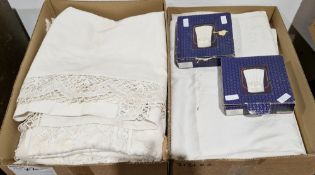 Two boxes of table linen, early to mid-20th century and two boxes of Porcelaine de Paris boxed