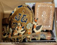 Various carved wooden models of elephants, a group of papier mache eggs and lacquered eggs, a