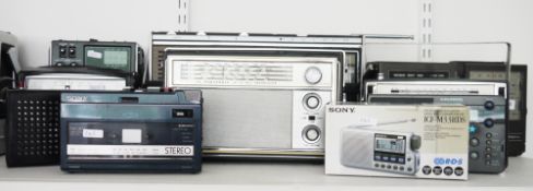 Collection of ten vintage transistor radios including Grundig Music Boy 150, Concert Boy 1100,