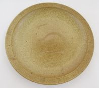 Ray Finch (1914-2012) for Winchcombe stoneware charger, speckled ground with incised wave