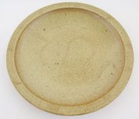 Ray Finch (1914-2012) for Winchcombe stoneware charger, speckled ground with incised wave