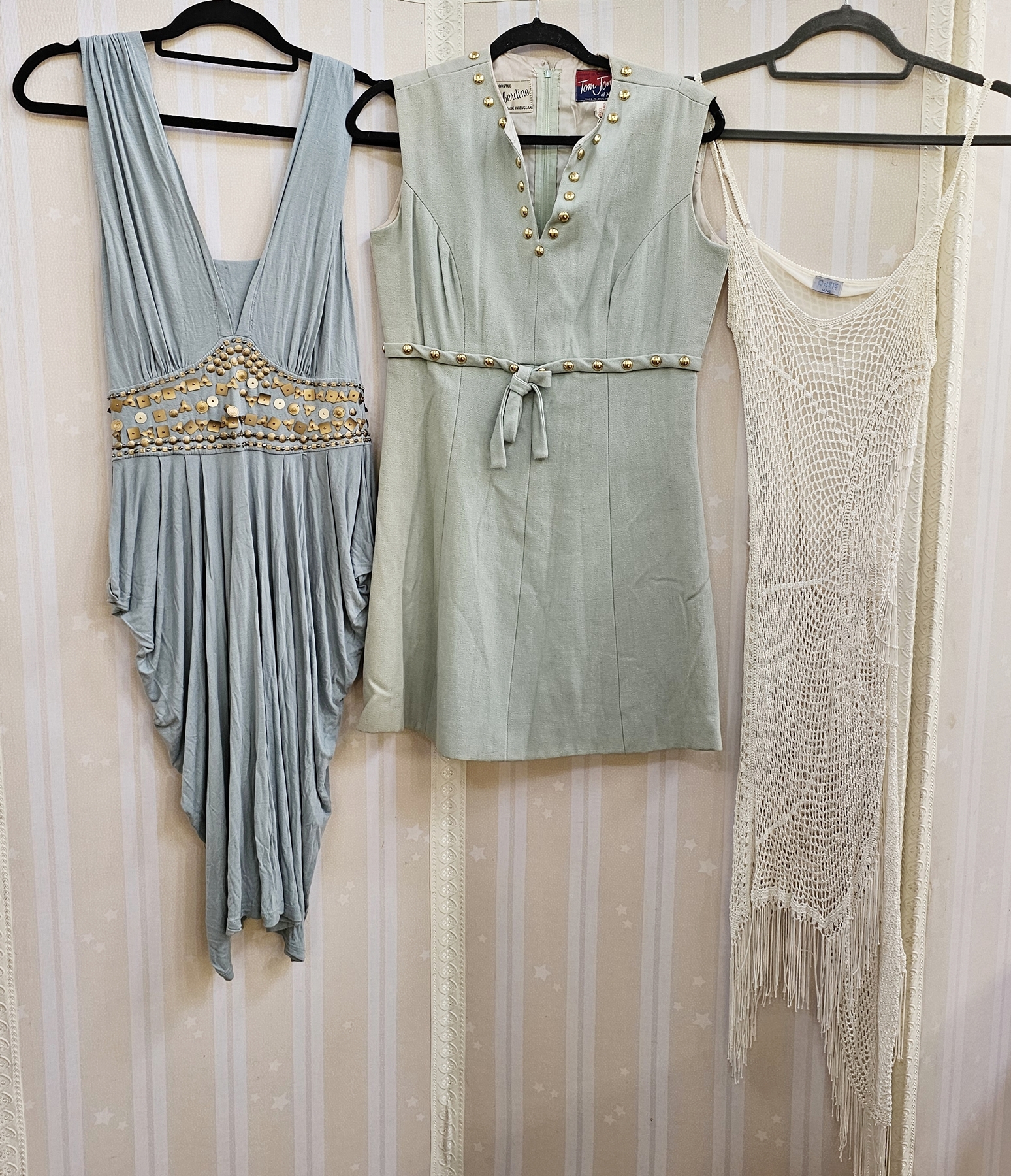 A vintage Wallis trouser suit, pale blue with printed flower design, the jacket kimono style sleeves