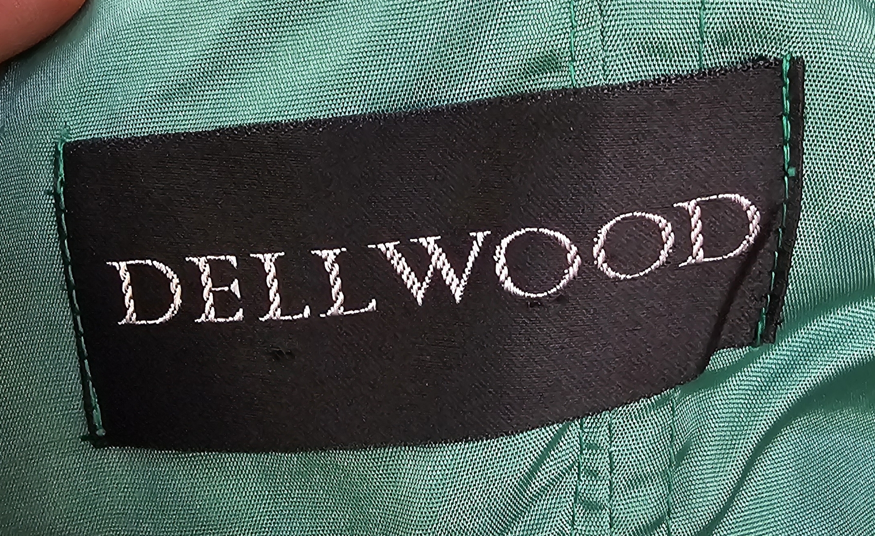 Raw silk emerald green evening gown with spaghetti straps, a pleated bodice and bow detail to the - Image 3 of 8