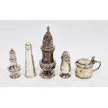 Victorian silver pepperette modelled as a caster, two other silver pepperettes, a silver mustard pot