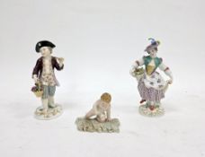 Two Meissen porcelain figures, comprising: a late 19th century figure of a boy holding two baskets