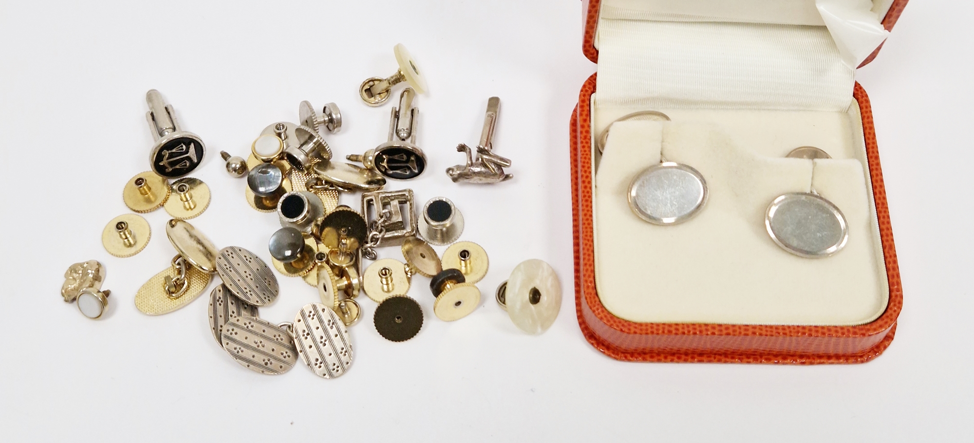 Pair of silver cufflinks with oval polished plates and chain links, in fitted case, and other