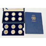 Set of twelve gold coins from the Unicef/IYC International Coin Program to commemorate the
