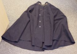 Early to mid 20th century Police wool cape, the collar with brass lion mask and chain fastening
