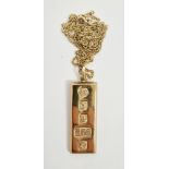 9ct gold ingot pendant with show hallmarks for Sheffield 1979, on 9ct gold chain, total weight 34.5g