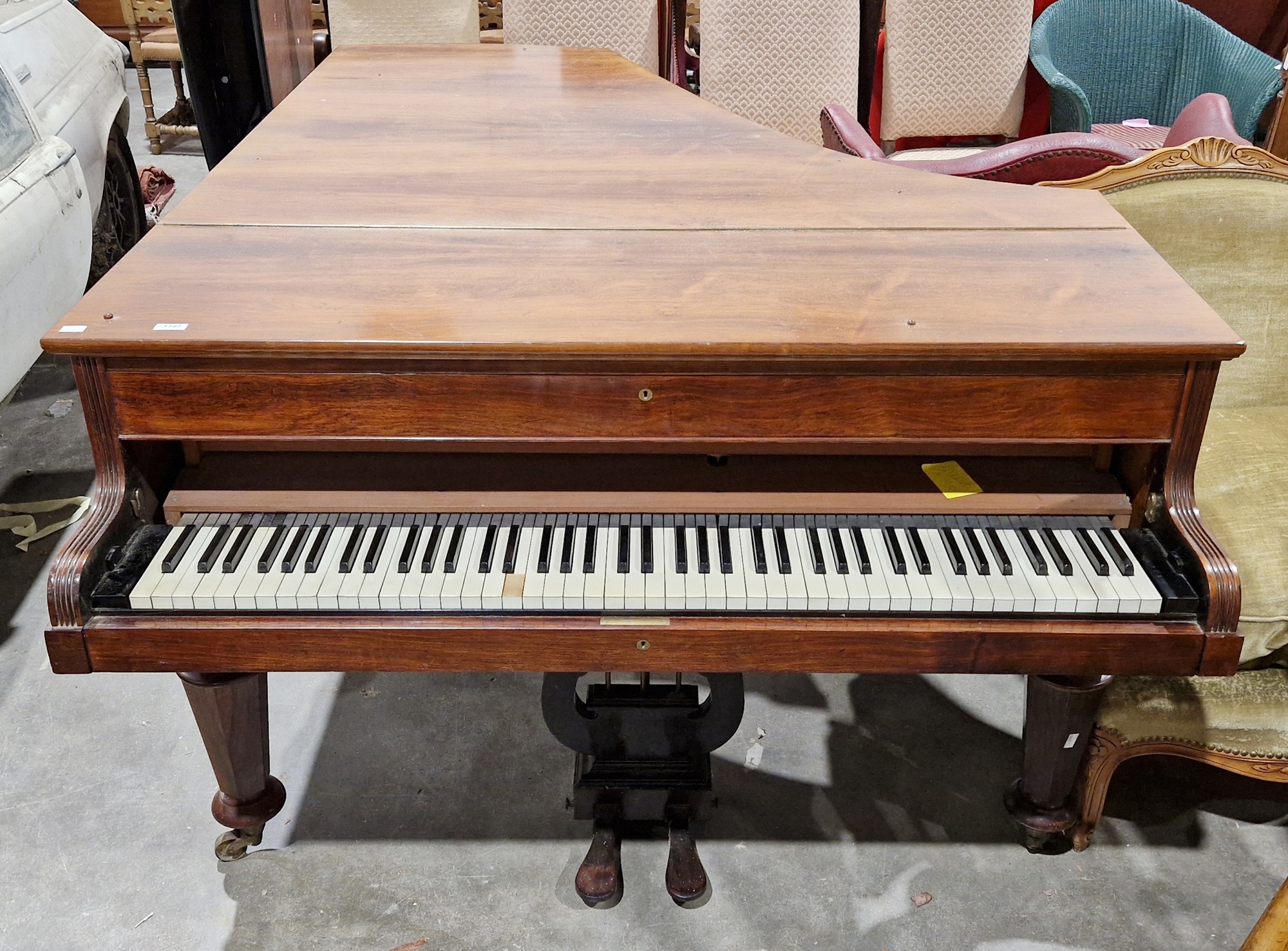 Late Victorian rosewood baby grand piano by John Broadwood & Sons of London, serial number 43079 (