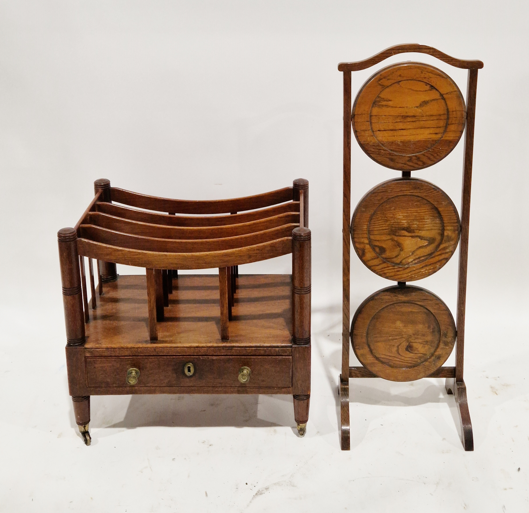 19th century mahogany canterbury with five divisions and drawer under, on short turned supports,