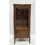 French mahogany and kingwood vitrine in the Louis XV manner, the marble top over a single part