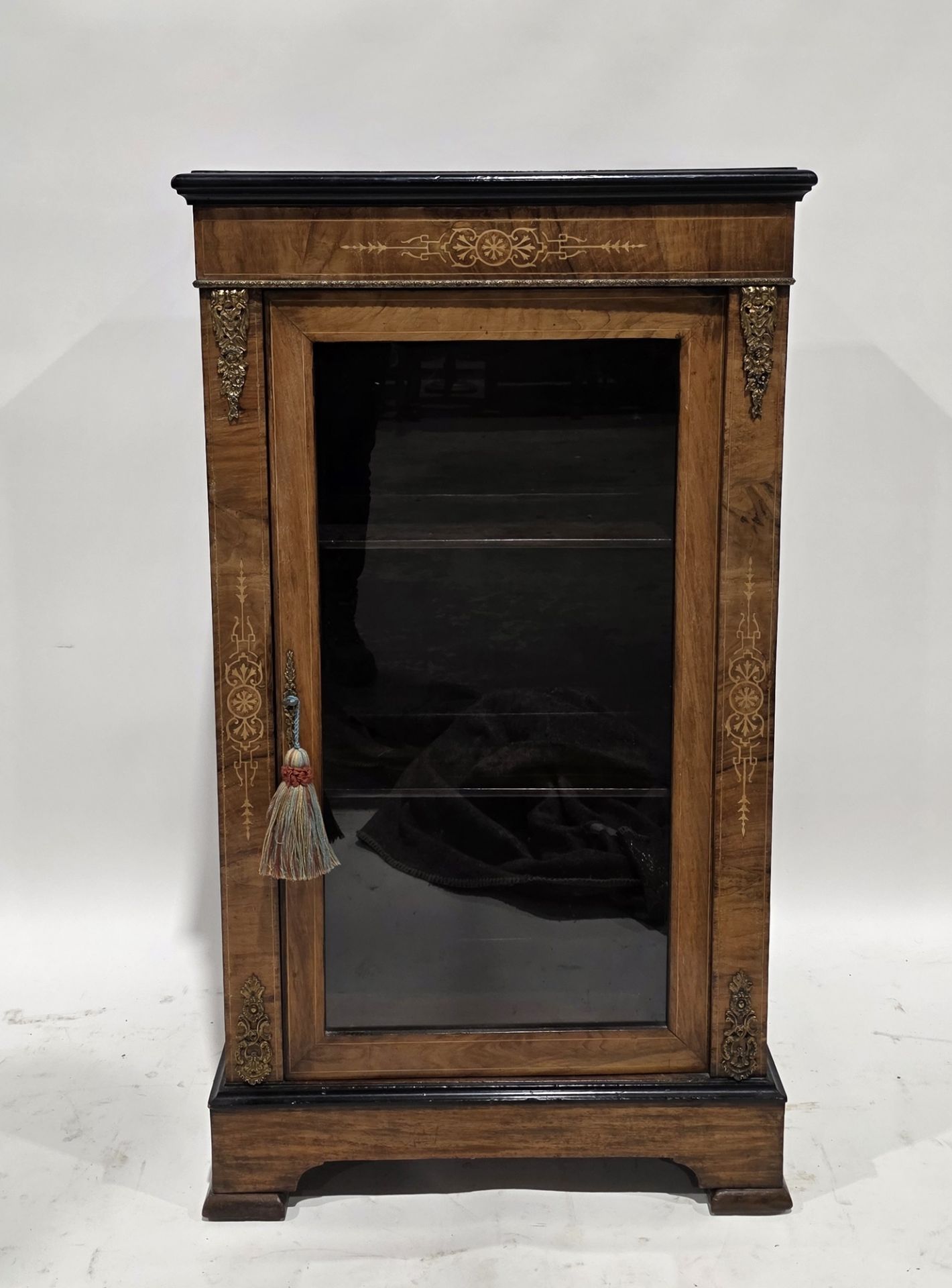 Victorian walnut and ebonised pier cabinet, the rectangular top with ebonised thumb moulded edge,