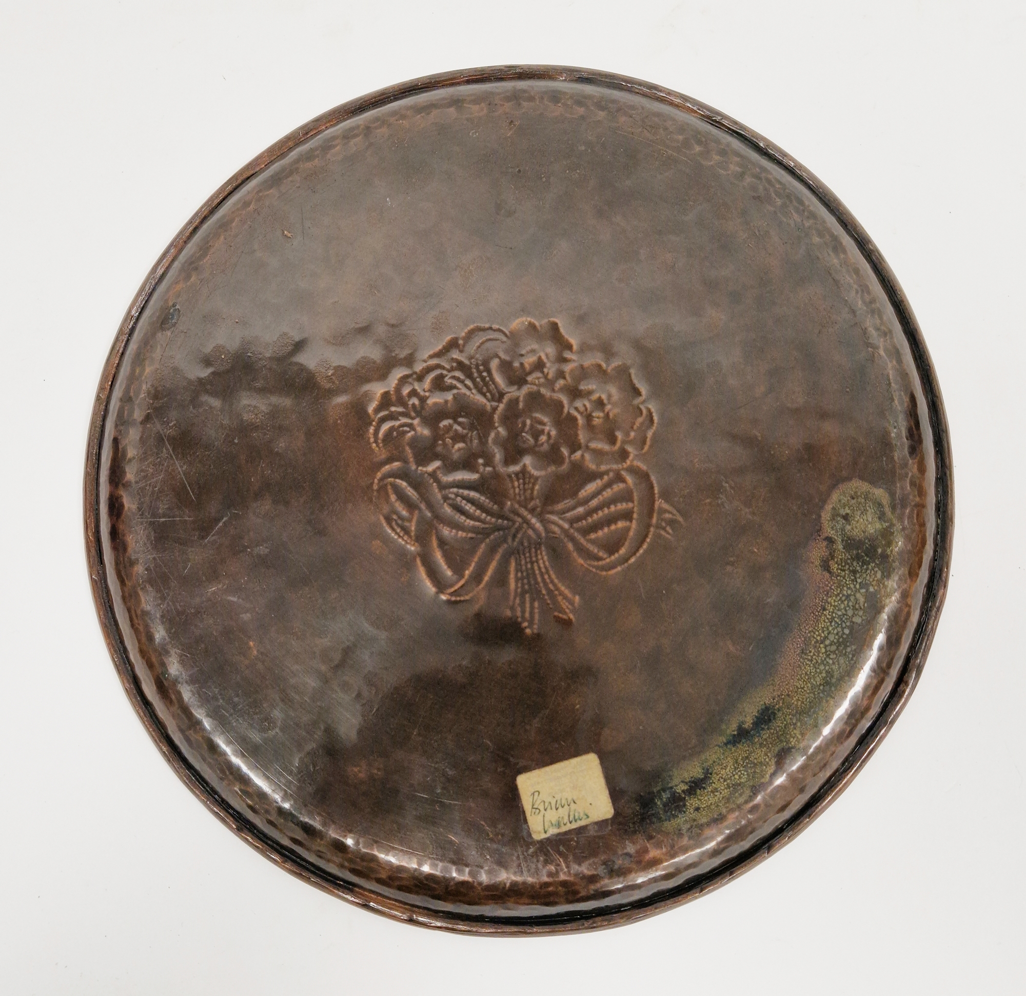 Hugh Wallis (British, 1871-1943), an Arts and Crafts copper and pewter inlaid tray of circular form, - Image 2 of 2