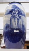 Royal Doulton pottery blue and white oviform vase, late 19th century, decorated with a mother and