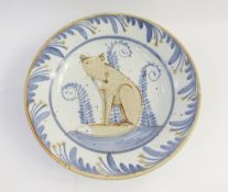 Andrew McGarva pottery bowl, decorated with fox to centre, within blue and white floral border, 40cm