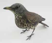 Ceramic and metal model mistle thrush with painted body on metal legs, impressed mark 'K', 20cm long