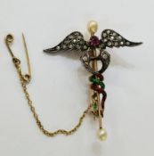 Late 19th/early 20th century gem set brooch formed as a caduceus, the serpent set with old cut
