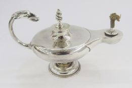 Silver lamp cigar lighter in the form of a Roman/Aladdin style oil lamp, with spiral finial to the
