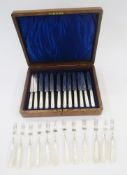 Set of twelve Edwardian silver and mother-of-pearl handled fruit/dessert knives and forks, 1905-