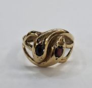 9ct yellow gold and garnet ring comprising two oval collet set mixed cut garnets of approx 5.3mm