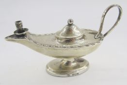 George V silver Roman lamp shaped table lighter, with single handle on oval pedestal base,