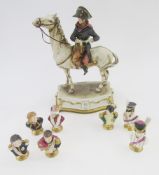 Capodimonte equestrian figure of Napoleon and seven small German porcelain military busts, the first