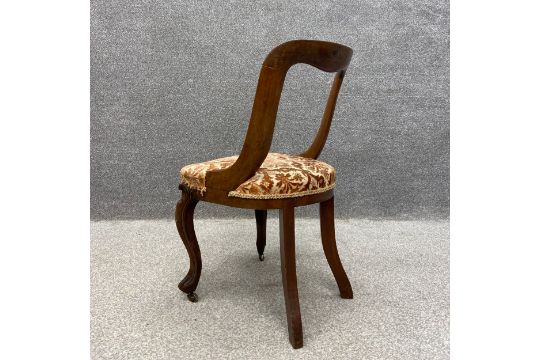 A 19th century child's walnut balloon back chair with a needlework upholstered serpentine fronted - Image 11 of 12