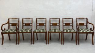 A set of six Regency style mahogany dining elbow chairs each having a carved barley-twist top rail