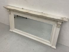 A C.1900 white painted overmantel mirror having a dentil moulded cornice with ball moulded frieze