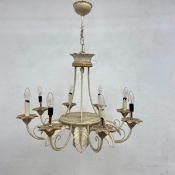 A painted metal 19th century style eight branch chandelier with scrolling acanthus leaf