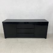 A contemporary lacquered sideboard. (Some scuffs and marks as seen). H.80 W.190 D.50cm
