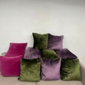 A collection of ten large contemporary feather filled cushions. 44x44cm