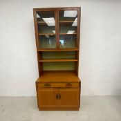 A mid century teak G-plan Sierra wall cabinet in two sections. H.198 W.84 D.46cm
