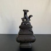 A Chinese Ming style patinated bronze censer with cover having a figural foo dog or temple lion