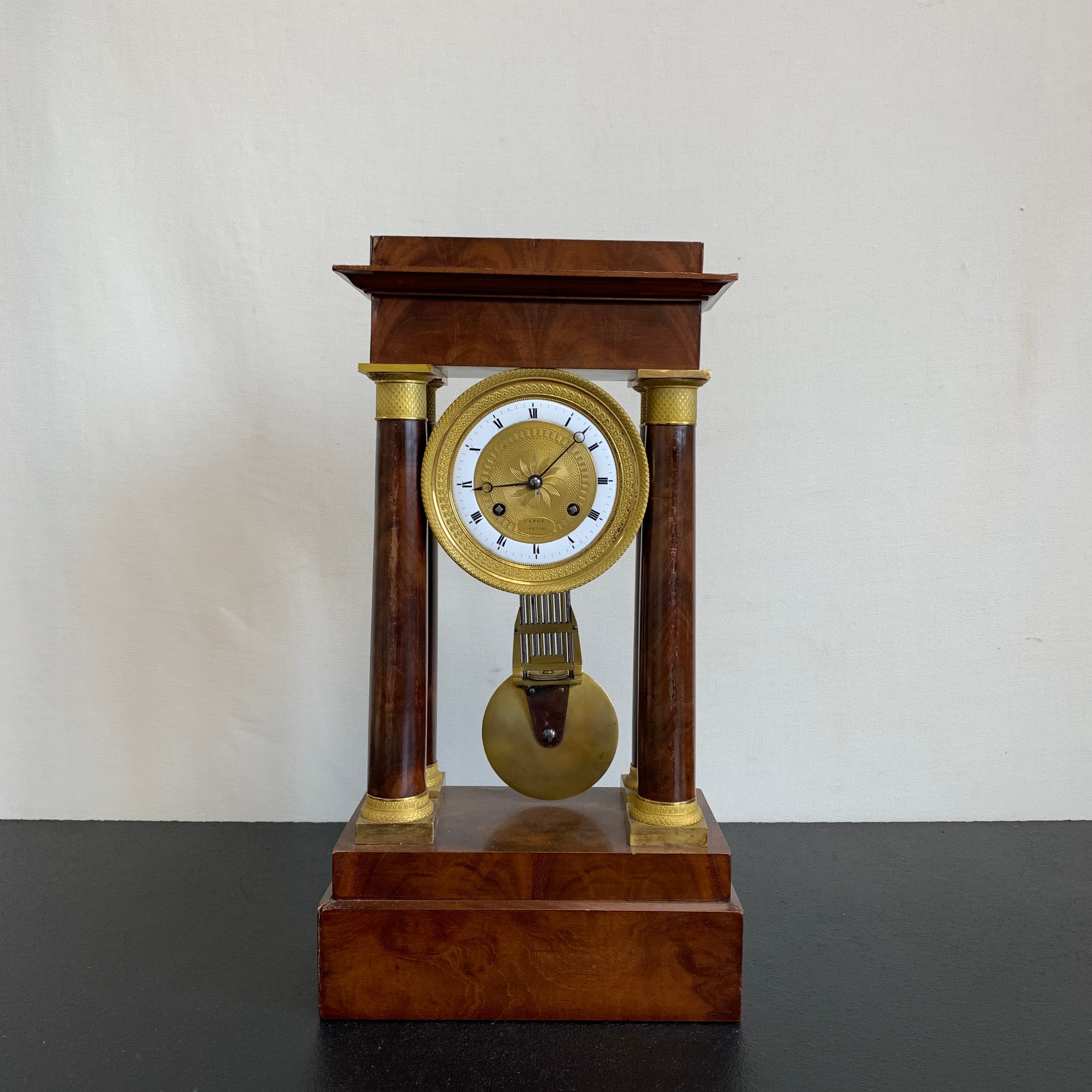 A 20th century gilt metal mounted French Empire style mahogany portico clock having a moulded - Image 2 of 7
