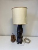 A treen lidded pear along with a carved hardwood African Tribal table lamp. H.64cm. (Lamp).