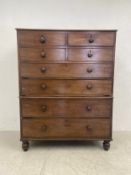 A Regency mahogany two section chest on chest with four short drawers above four long drawers on