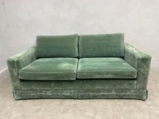 A Colefax and Fowler Mousson style sofa upholstered in Mogador velvet. L.210 D.105cm
