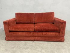 A Colefax and Fowler Mousson style upholstered sofa in Sibton fabric. L.200 D.105cm