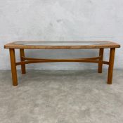A 1970s vintage teak Nathan coffee table with inset plate glass top. H.44 W.121 D.46cm.